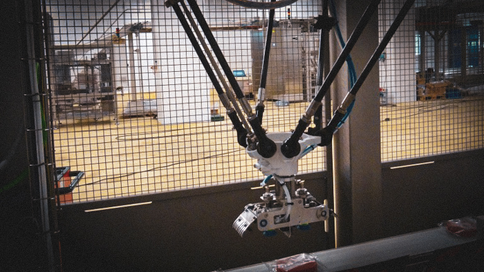 Robot delta en train de manipuler des sachets flowpack
